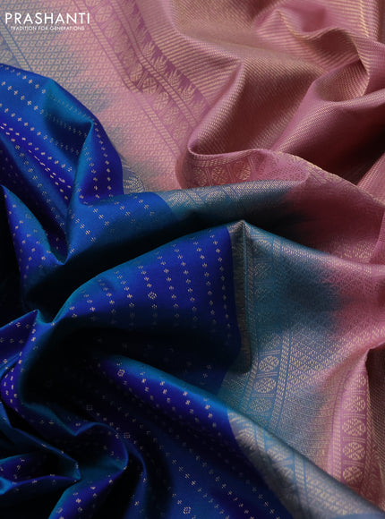 Pure kanchipuram silk saree dual shade of bluish green and pastel pink with allover zari woven butta weaves and long zari woven korvai border