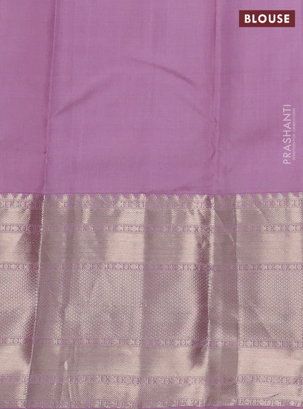 Pure kanchipuram silk saree dual shade of bluish green and pastel pink with allover zari woven butta weaves and long zari woven korvai border