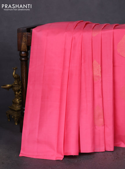 Pure kanchipuram silk saree peach pink and bottle green with zari woven buttas in borderless style