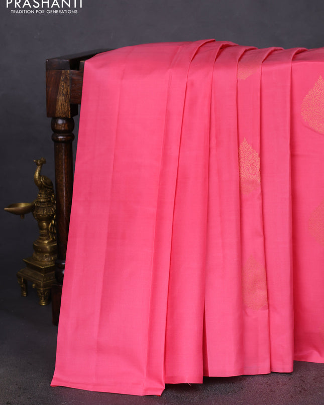 Pure kanchipuram silk saree peach pink and bottle green with zari woven buttas in borderless style