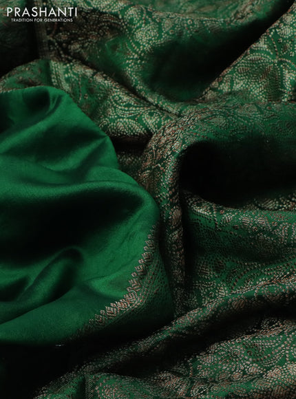 Chiniya silk saree green with plain body and woven border