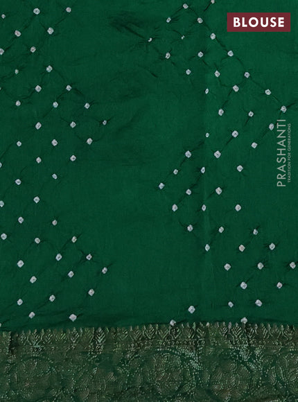 Chiniya silk saree green with plain body and woven border