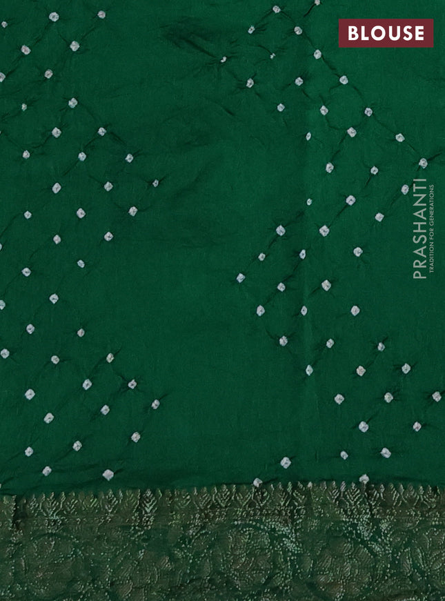 Chiniya silk saree green with plain body and woven border