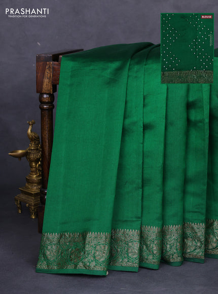 Chiniya silk saree green with plain body and woven border