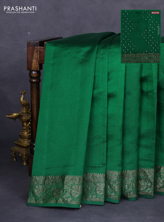 Chiniya silk saree green with plain body and woven border