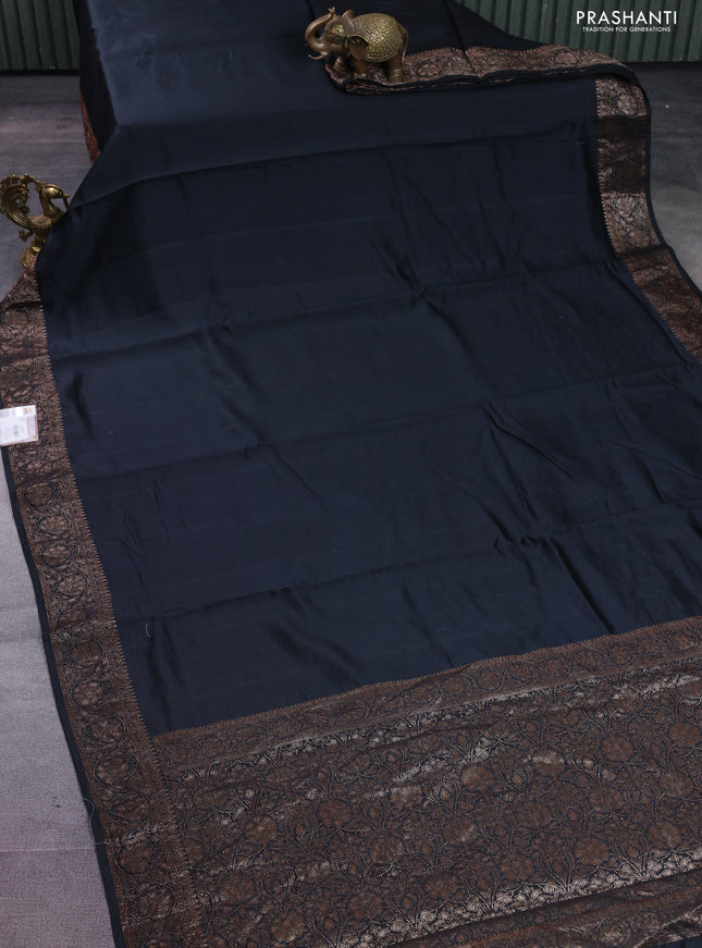 Chiniya silk saree black with plain body and woven border