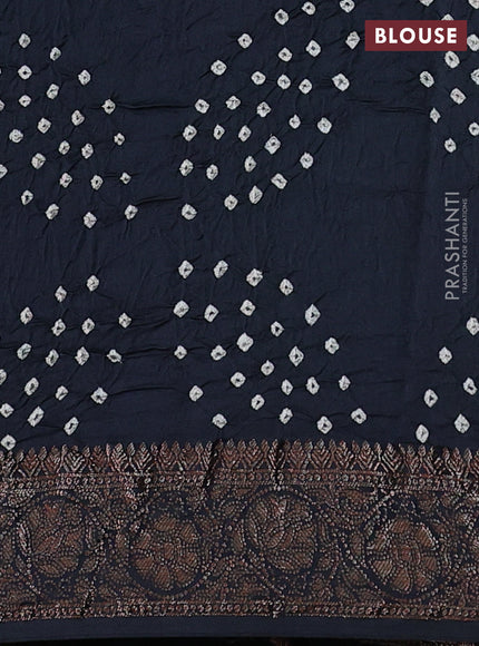 Chiniya silk saree black with plain body and woven border