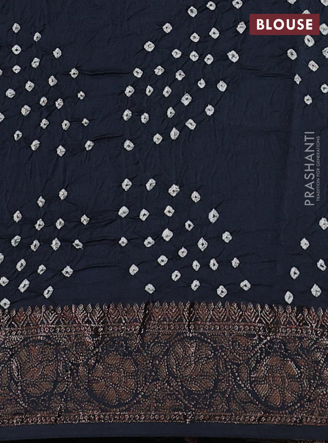 Chiniya silk saree black with plain body and woven border