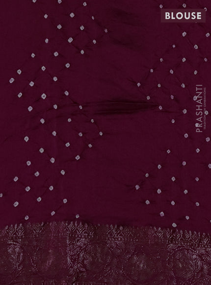 Chiniya silk saree wine shade with plain body and woven border