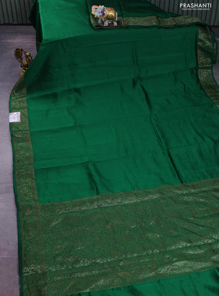 Chiniya silk saree green with plain body and woven border