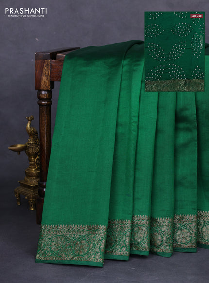 Chiniya silk saree green with plain body and woven border