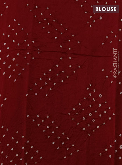 Chiniya silk saree maroon with plain body and woven border