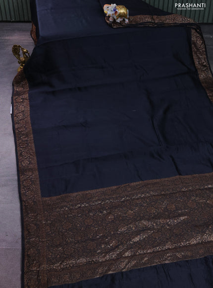 Chiniya silk saree black with plain body and woven border