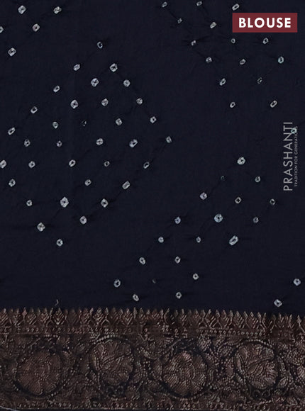 Chiniya silk saree black with plain body and woven border