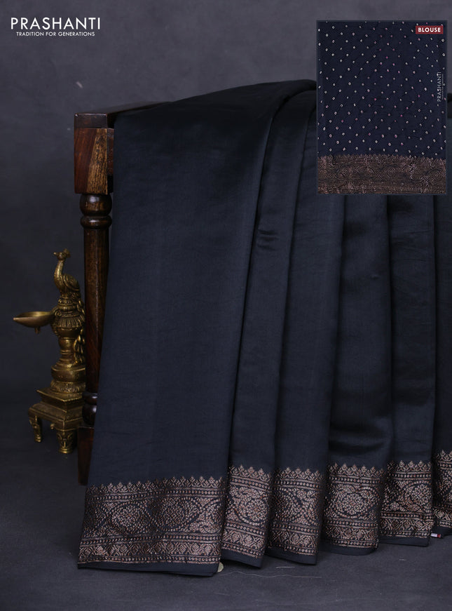 Chiniya silk saree black with plain body and woven border