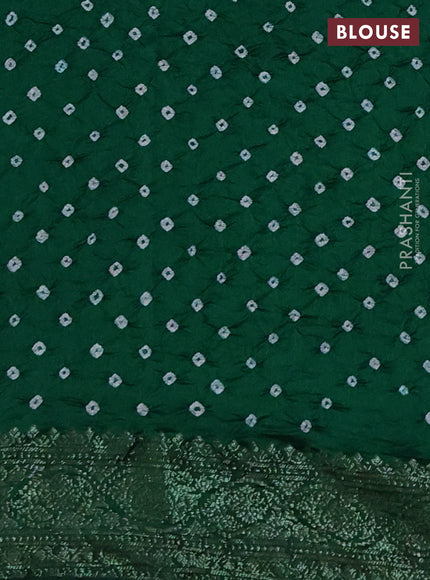 Chiniya silk saree green with plain body and woven border