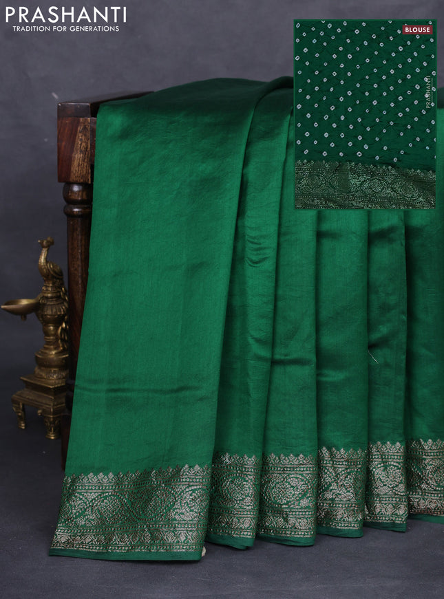 Chiniya silk saree green with plain body and woven border
