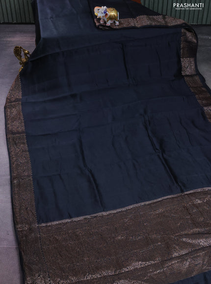 Chiniya silk saree black with plain body and woven border