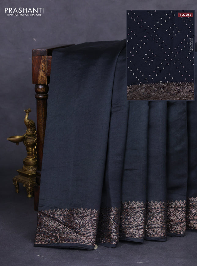 Chiniya silk saree black with plain body and woven border