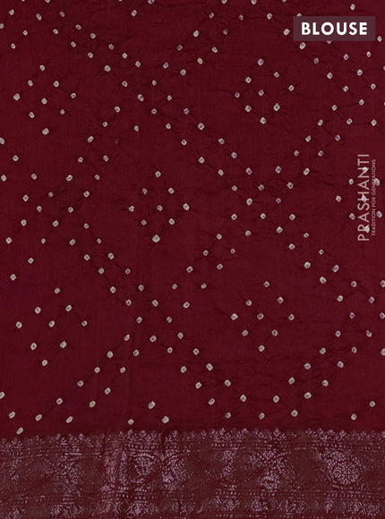 Chiniya silk saree maroon with plain body and woven border