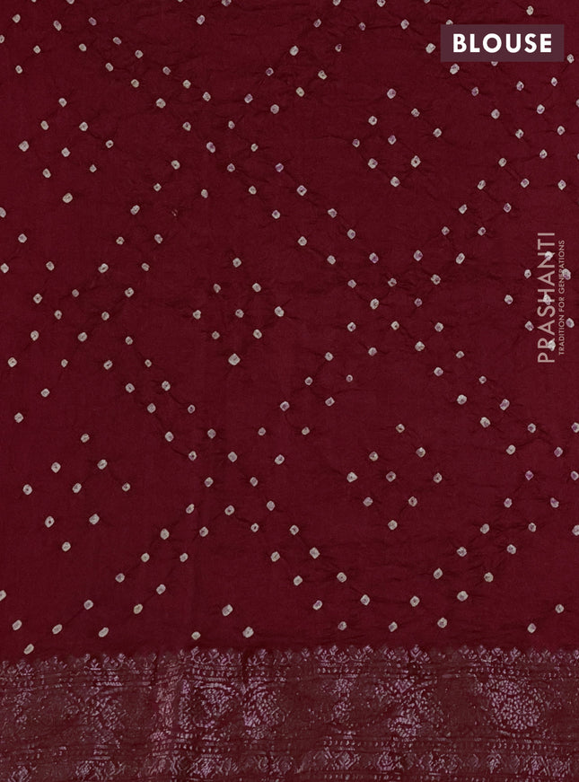 Chiniya silk saree maroon with plain body and woven border