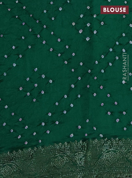 Chiniya silk saree green with plain body and woven border