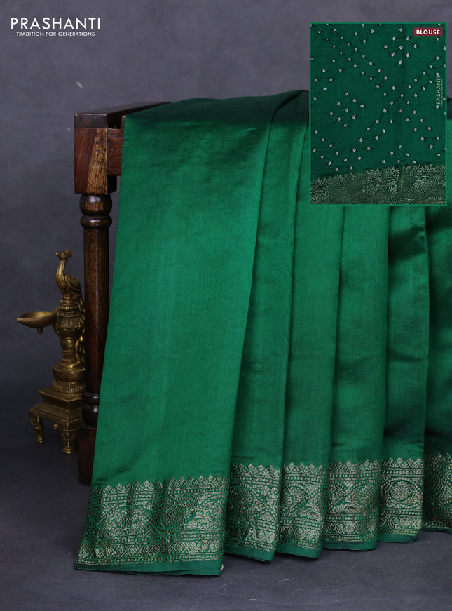Chiniya silk saree green with plain body and woven border