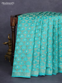 Chiniya silk saree teal green and cs blue with allover zari weaves & bandhini prints and zari woven border