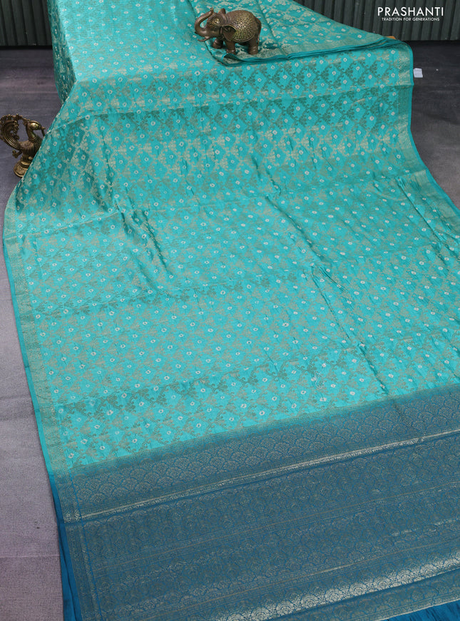 Chiniya silk saree teal green and cs blue with allover zari weaves & bandhini prints and zari woven border