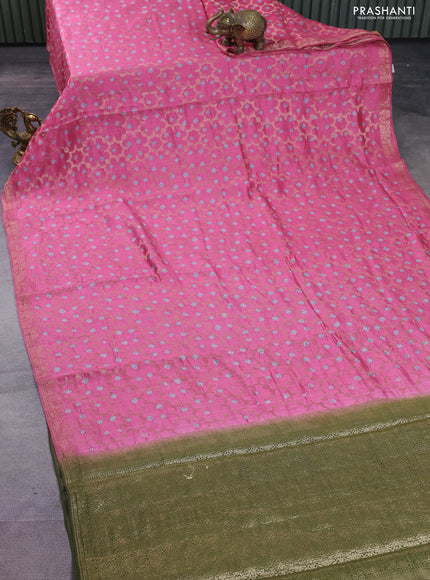 Chiniya silk saree peach pink and mehendi green with allover zari weaves & bandhini prints and zari woven border