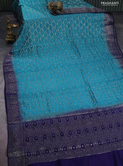 Chiniya silk saree teal blue and blue with allover zari weaves & bandhini prints and zari woven border