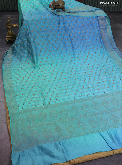 Chiniya silk saree pastel blue and teal green with allover zari buttas & bandhini prints and zari woven border