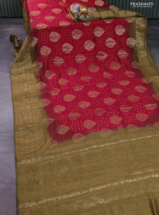 Chiniya silk saree magenta pink and military green with allover zari buttas & bandhini prints and zari woven border