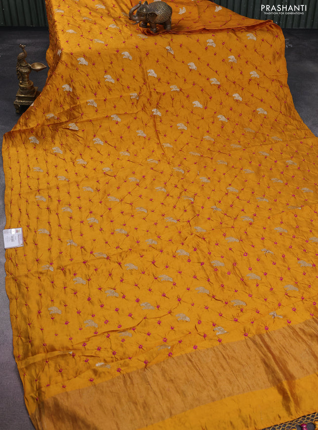 Chiniya silk saree mustard yellow and pink with allover zari buttas & bandhini prints in borderless style