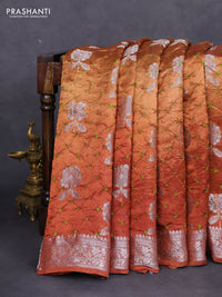 Chiniya silk saree rust shade with allover silver zari buttas & bandhini prints and silver zari woven border