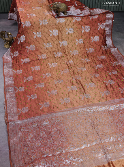 Chiniya silk saree rust shade with allover silver zari buttas & bandhini prints and silver zari woven border