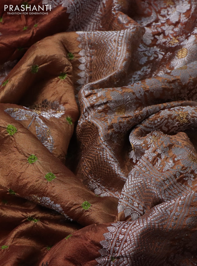 Chiniya silk saree rust shade with allover silver zari buttas & bandhini prints and silver zari woven border
