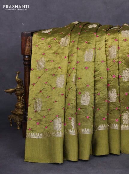 Chiniya silk saree sap green with allover zari buttas & bandhini prints and zari woven simple border