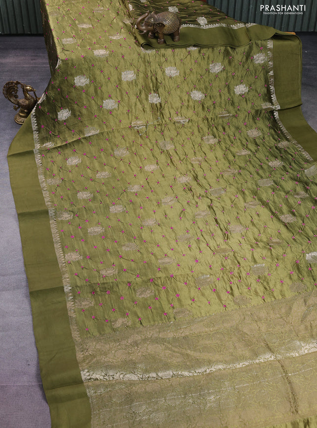 Chiniya silk saree sap green with allover zari buttas & bandhini prints and zari woven simple border