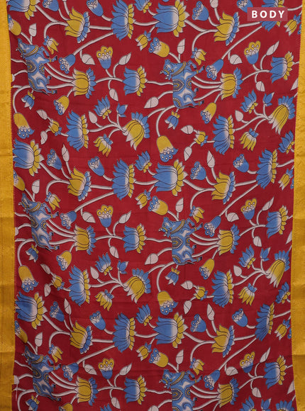 Kalamkari semi silk saree maroon and yellow with allover prints and zari woven border