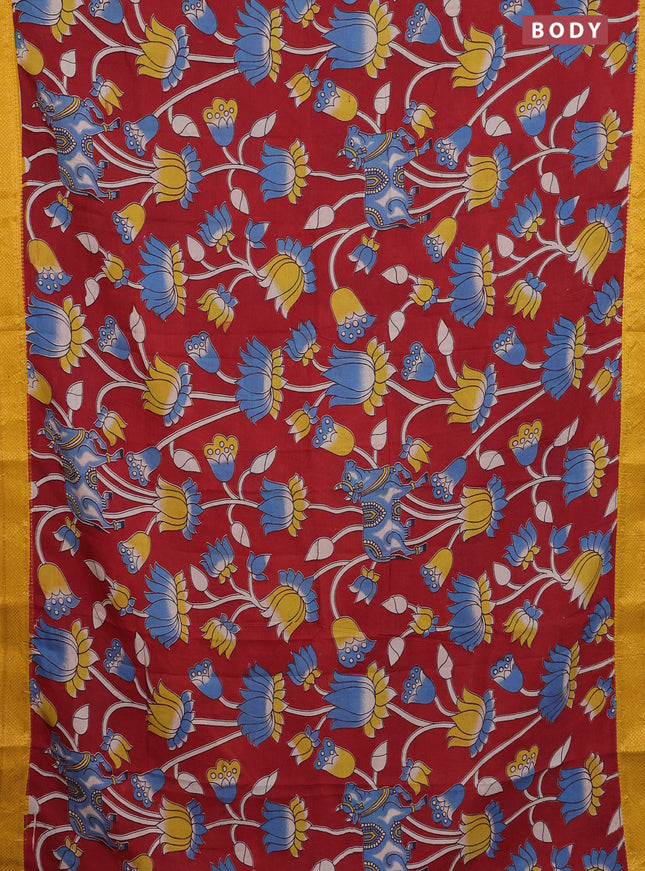 Kalamkari semi silk saree maroon and yellow with allover prints and zari woven border