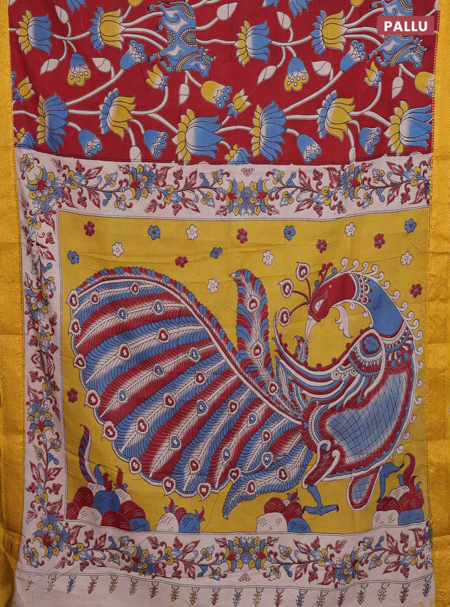 Kalamkari semi silk saree maroon and yellow with allover prints and zari woven border