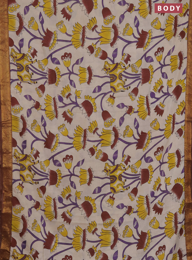 Kalamkari semi silk saree beige and brown with allover prints and zari woven border