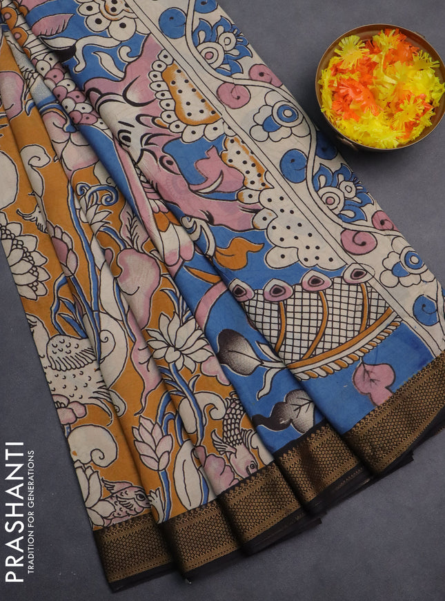 Kalamkari semi silk saree dark mustard and black with allover prints and zari woven border