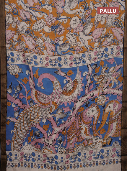 Kalamkari semi silk saree dark mustard and black with allover prints and zari woven border