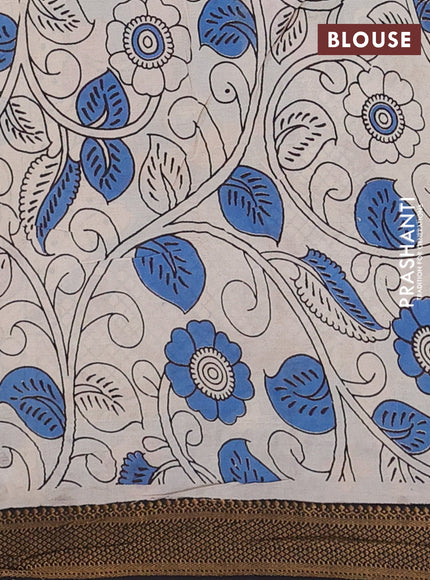 Kalamkari semi silk saree dark mustard and black with allover prints and zari woven border