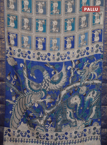 Kalamkari semi silk saree beige blue and multi colour with allover prints and zari woven border