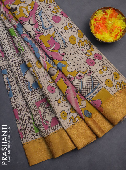 Kalamkari semi silk saree beige mustard yellow and multi colour with allover prints and zari woven border