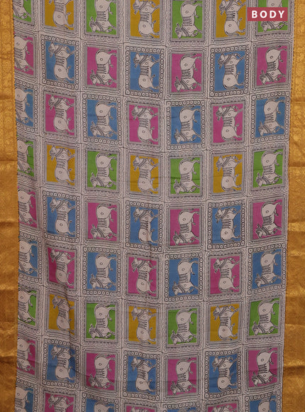 Kalamkari semi silk saree beige mustard yellow and multi colour with allover prints and zari woven border