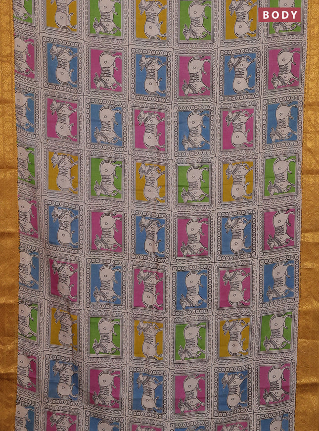 Kalamkari semi silk saree beige mustard yellow and multi colour with allover prints and zari woven border